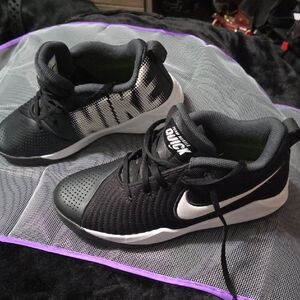Womans Team Hustle Nike Black and White Shoes Orginal Price 55.00 To 65.00